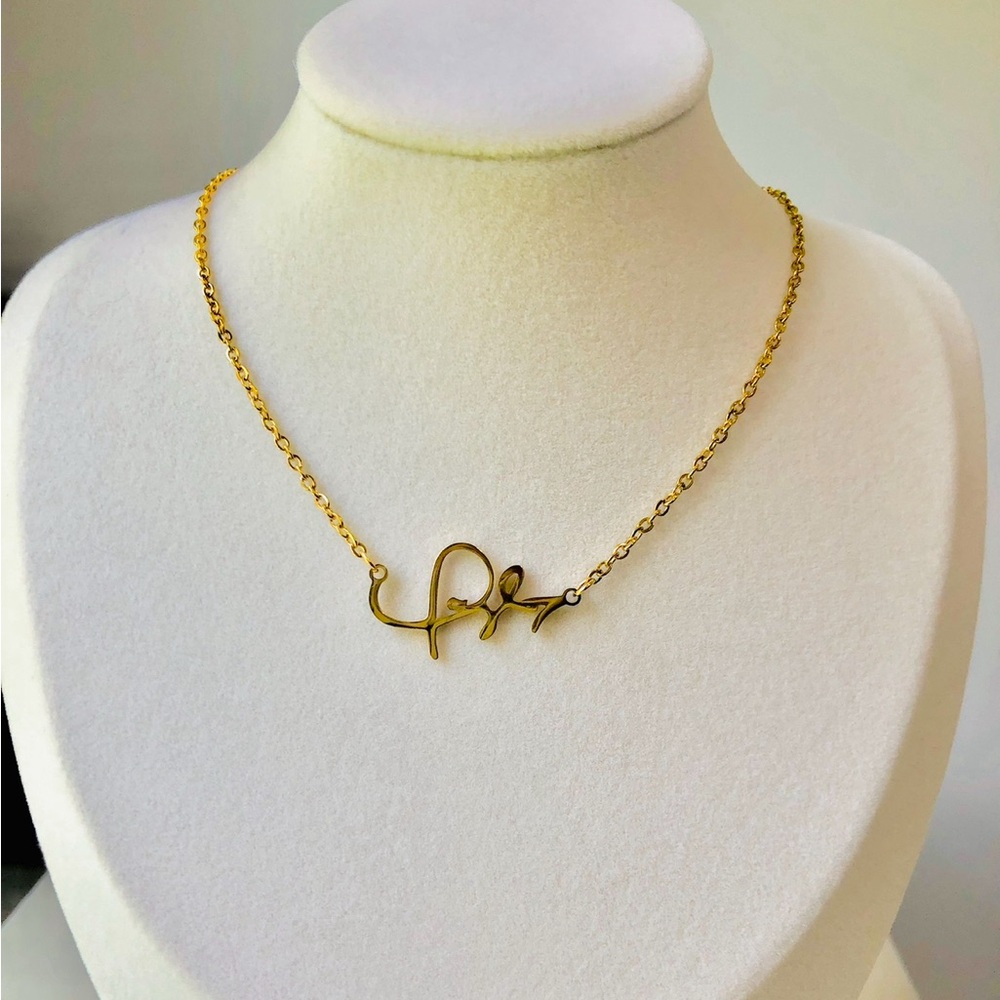 Stainless Steel, Gold Plated 
Taylor Swift Signature